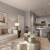 living room with seating and large pieces of art on the wall