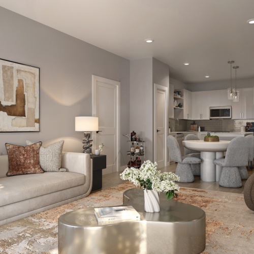 living room with seating and large pieces of art on the wall