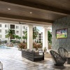 open-air style lounge area beside the pool